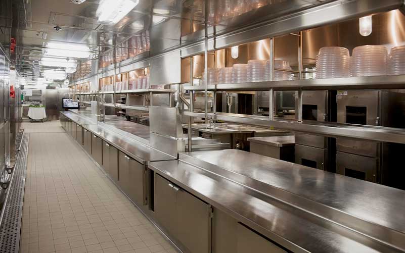 The food prep section of a large, commercial kitchen.