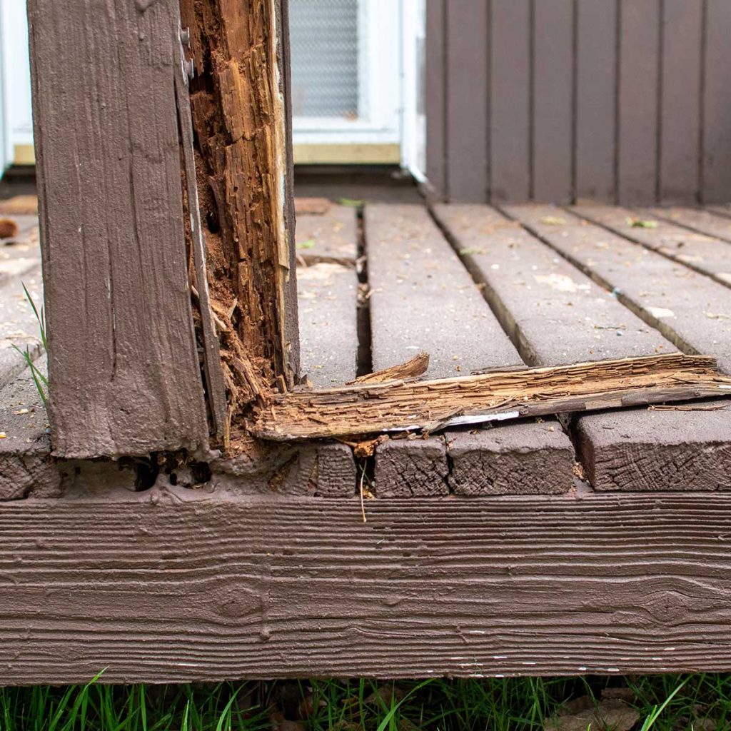 Wooden deck with termite damage to one of the posts
